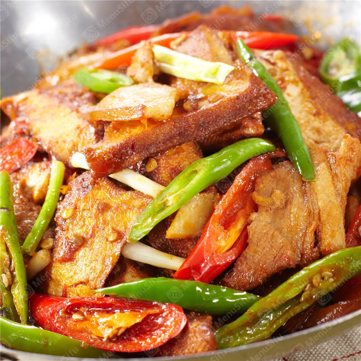 Tofu stir - fried with green chilies, red peppers, and pork in a dry pot at 成都名堂 SZECHUAN MASTER, a Chinese restaurant in Plano